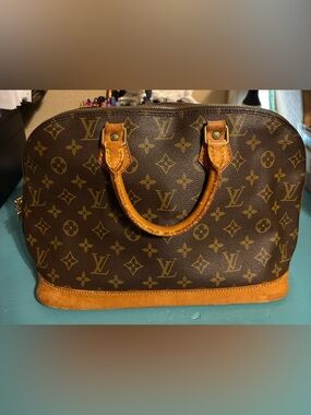 Louis Vuitton Alama PM